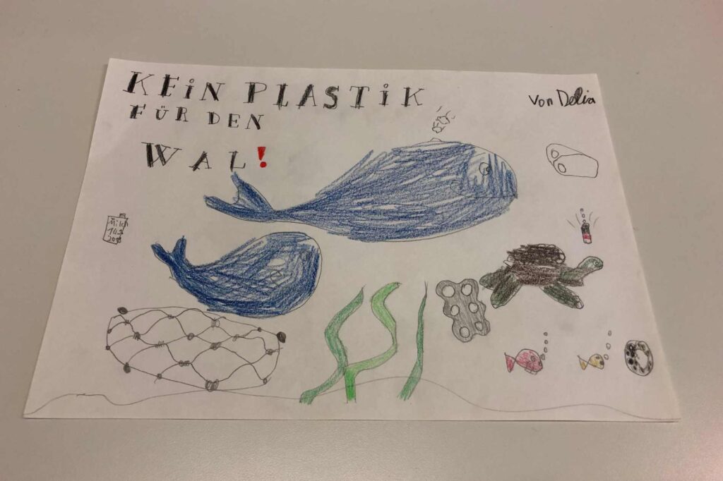 Kinderlesetage-ozeankind-Plastikmüll